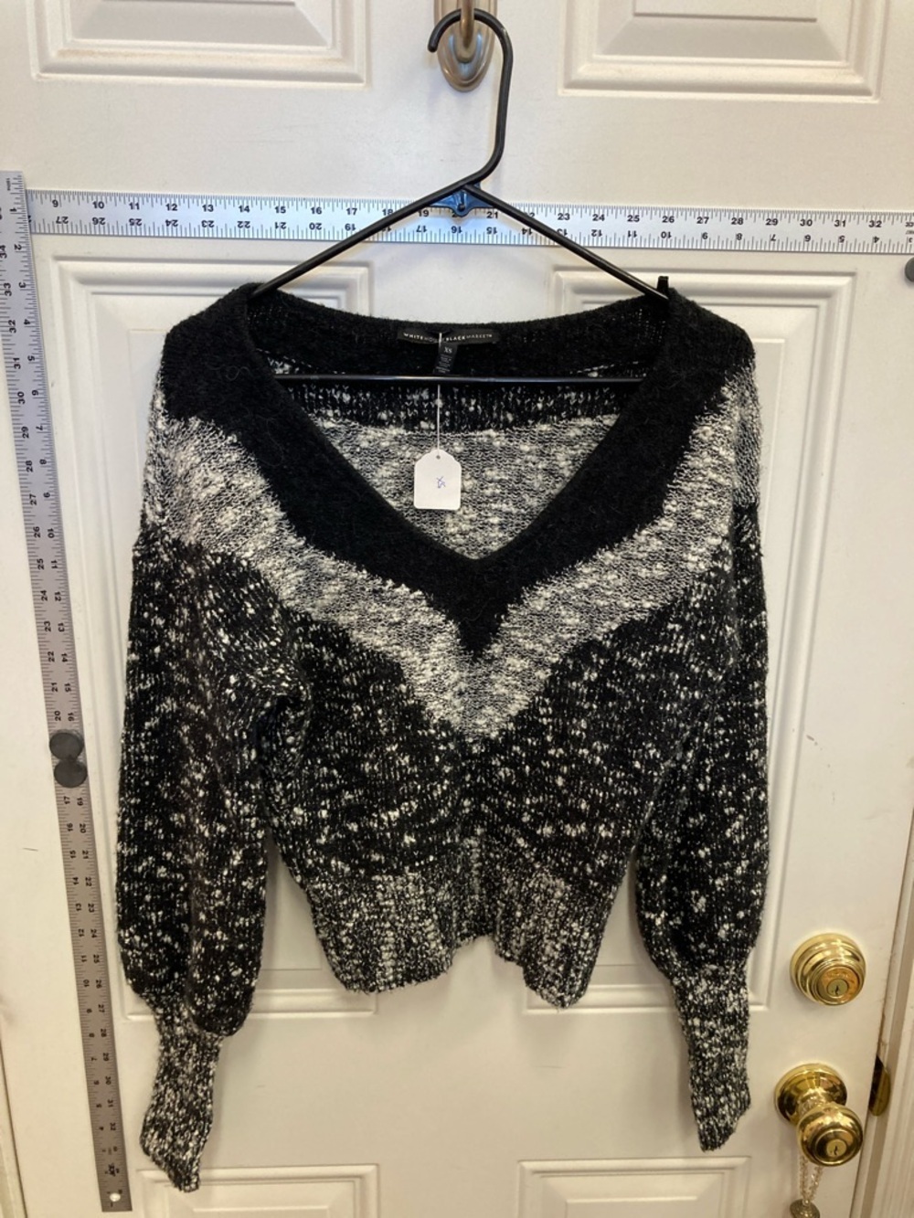 V-Neck Sweater, form fitting, tight bottom sleeves, soft textured yarn, ribbed